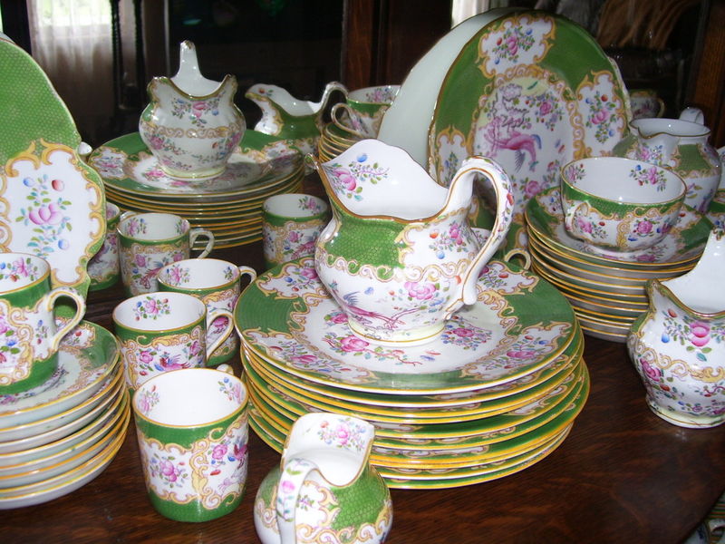 Minton Cockatrice China Service. a 52-piece service in a pattern beloved by...